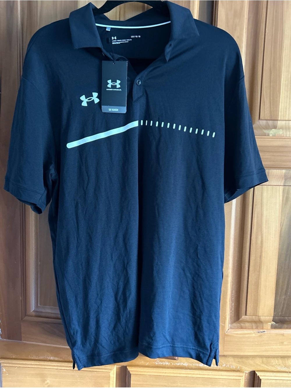 NWT Under Armour vanish title Men’s Black Polo with white Accent new